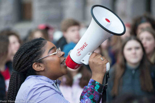 Student holding a bullhorn