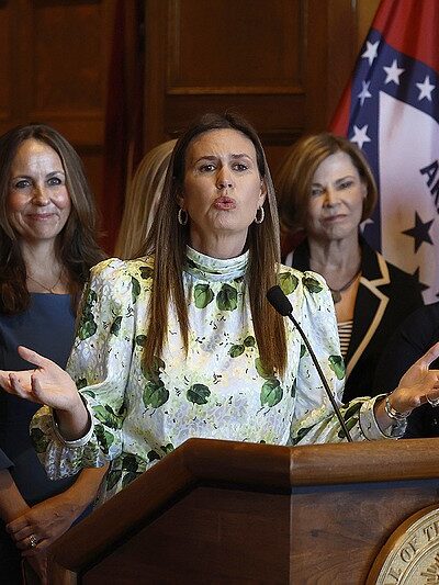 Arkansas governor Sarah Huckabee Sanders addresses press at a conference unveiling her newest executive order banning the use of gender-neutral language in Arkansas government documents