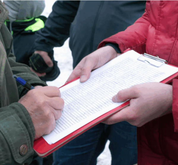 Man signing public petition