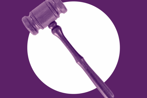 Gavel on purple background