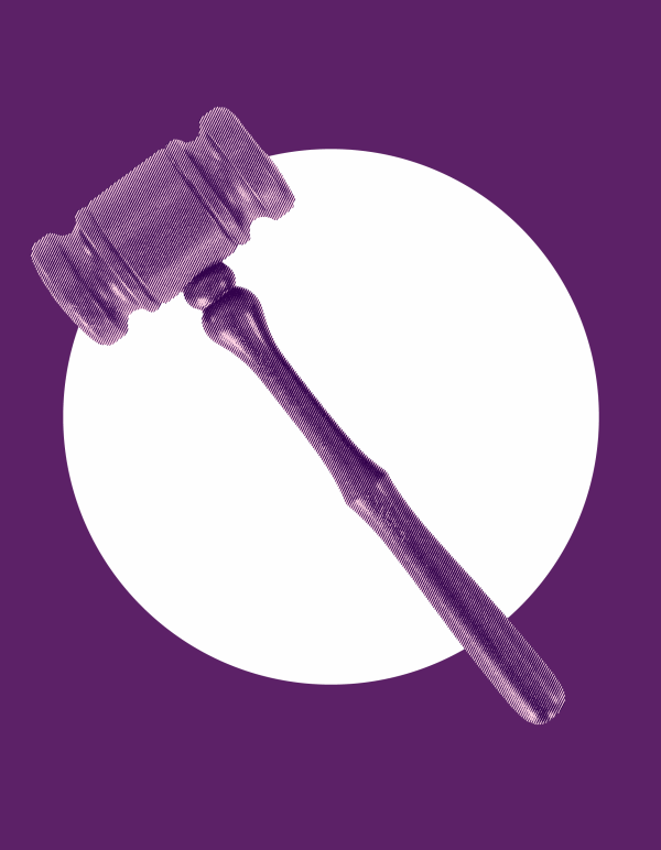 Gavel on purple background