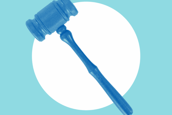 Blue gavel on blue background