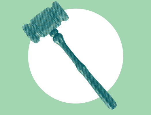 A gavel on a green background.