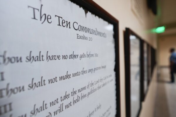 The Ten Commandments displayed on the wall.