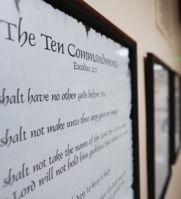 The Ten Commandments displayed on the wall.