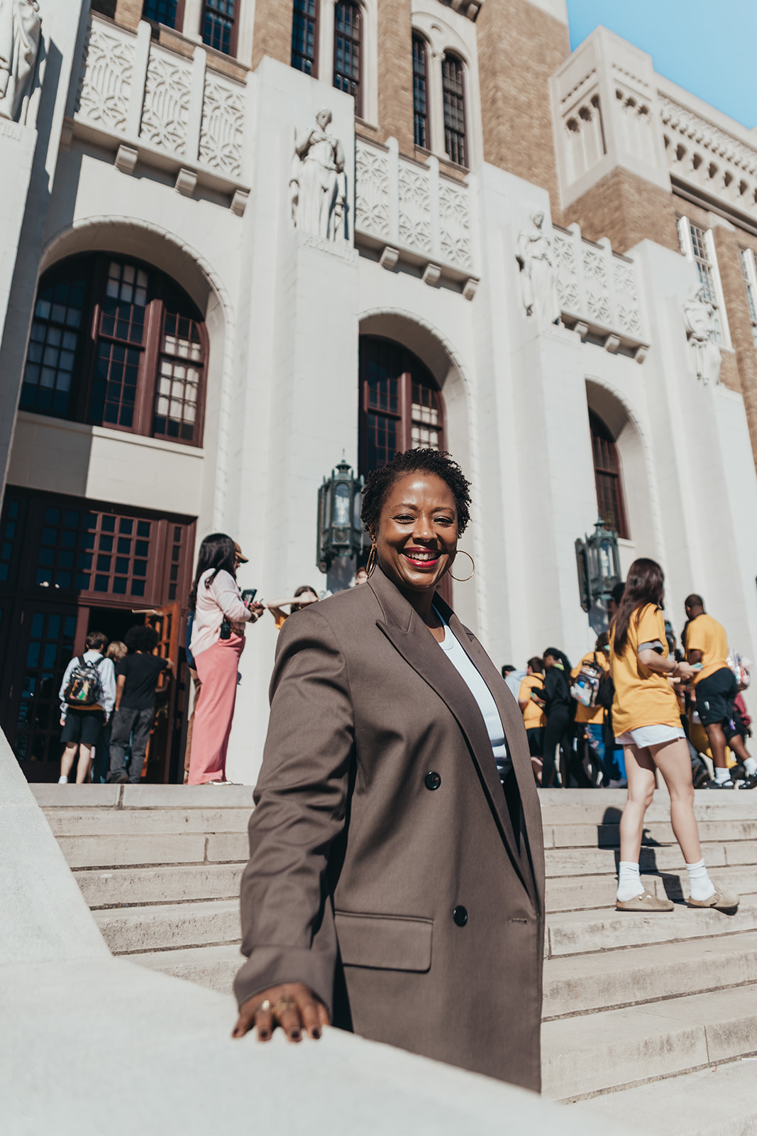 ACLU President Deborah Archer poses outside Central High School in Little Rock.