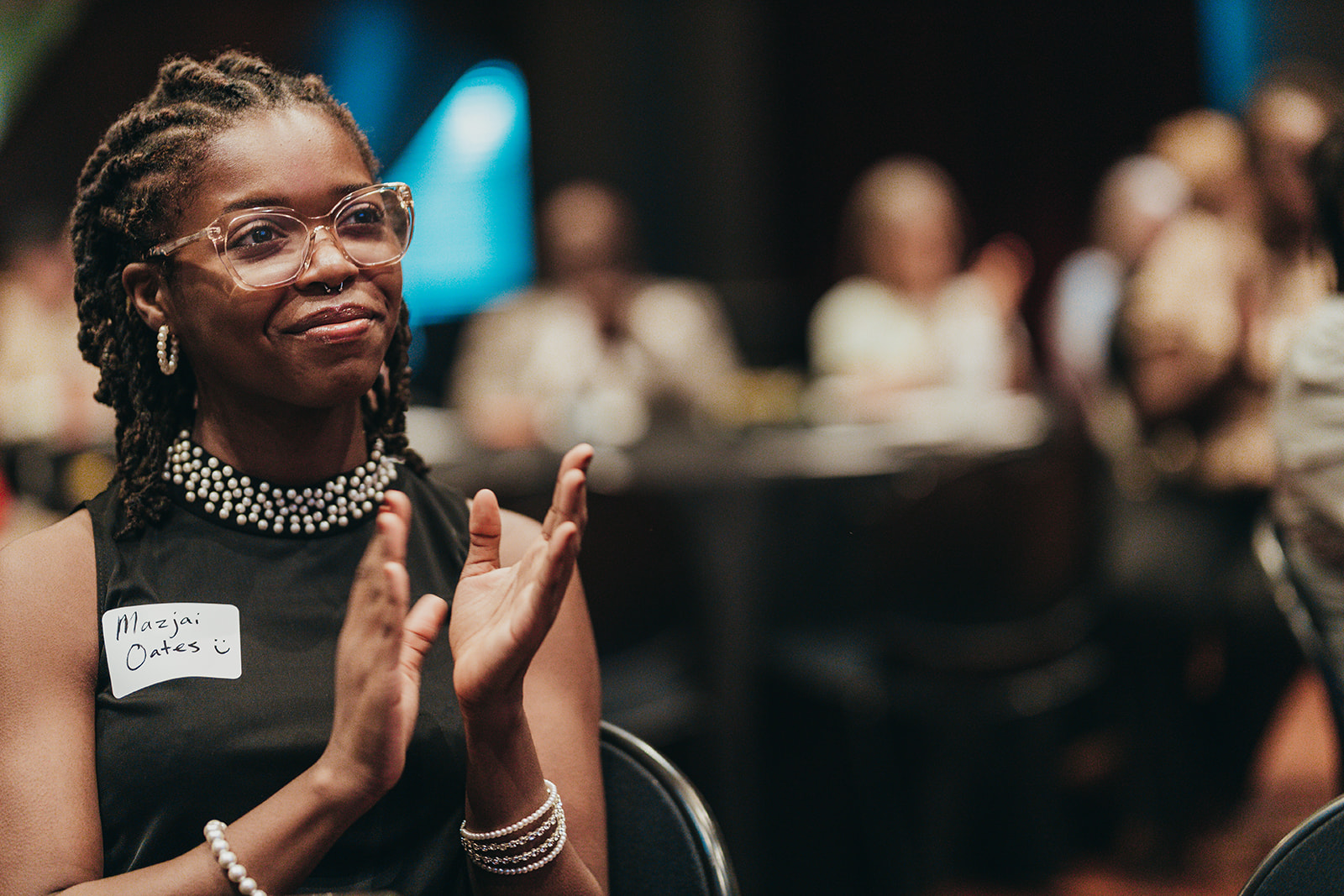 Mazjai Oates listens to ACLU President Deborah Archer speak at the Mosaic Templars Cultural Center in Little Rock on Oct. 7.