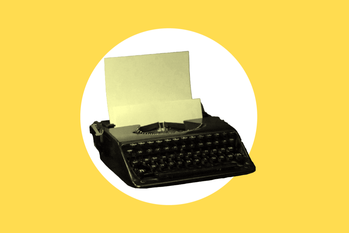 Typewriter On Yellow Background