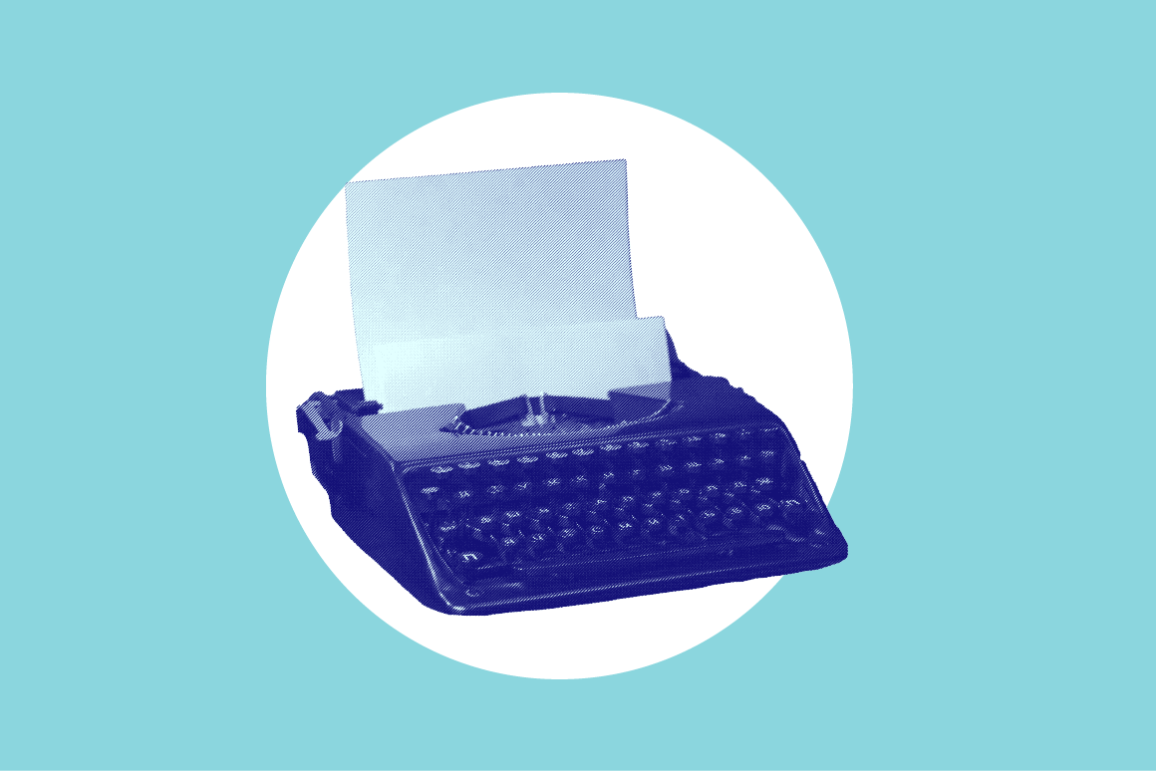Blue typewriter on blue background.