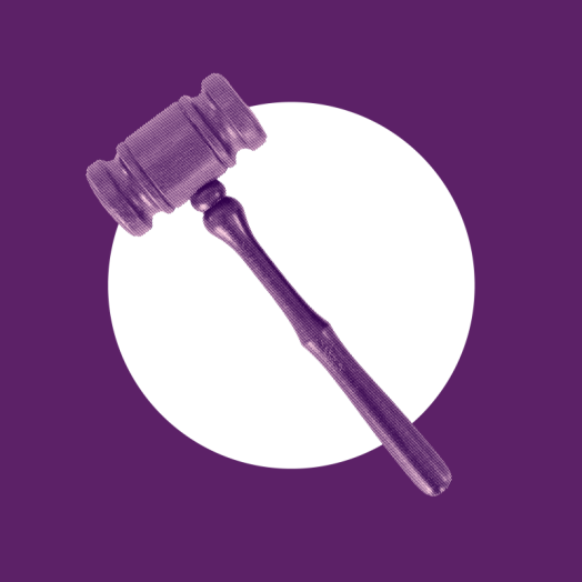 Gavel on purple background