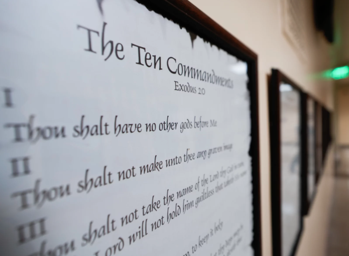 A copy of the 10 Commandments hanging in a hallway. 