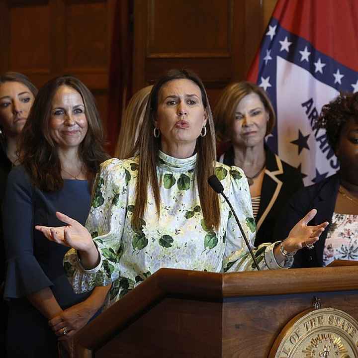 Arkansas governor Sarah Huckabee Sanders addresses press at a conference unveiling her newest executive order banning the use of gender-neutral language in Arkansas government documents 