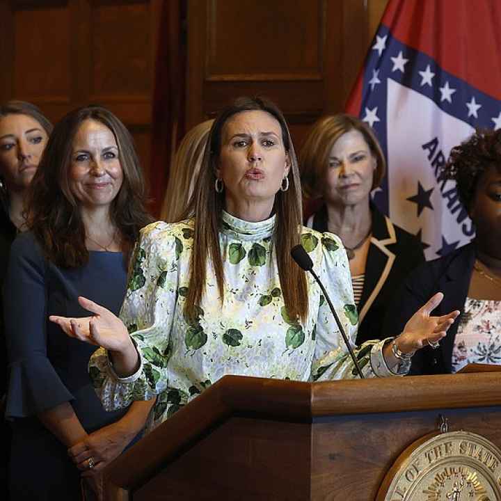 Arkansas governor Sarah Huckabee Sanders addresses press at a conference unveiling her newest executive order banning the use of gender-neutral language in Arkansas government documents