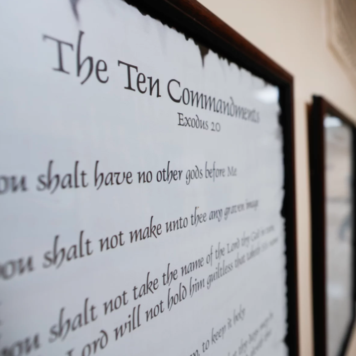 A copy of the 10 Commandments hanging in a hallway. 
